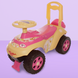Дитяча машинка толокар для дівчаток рожева 0141/07 фото 1 з 6